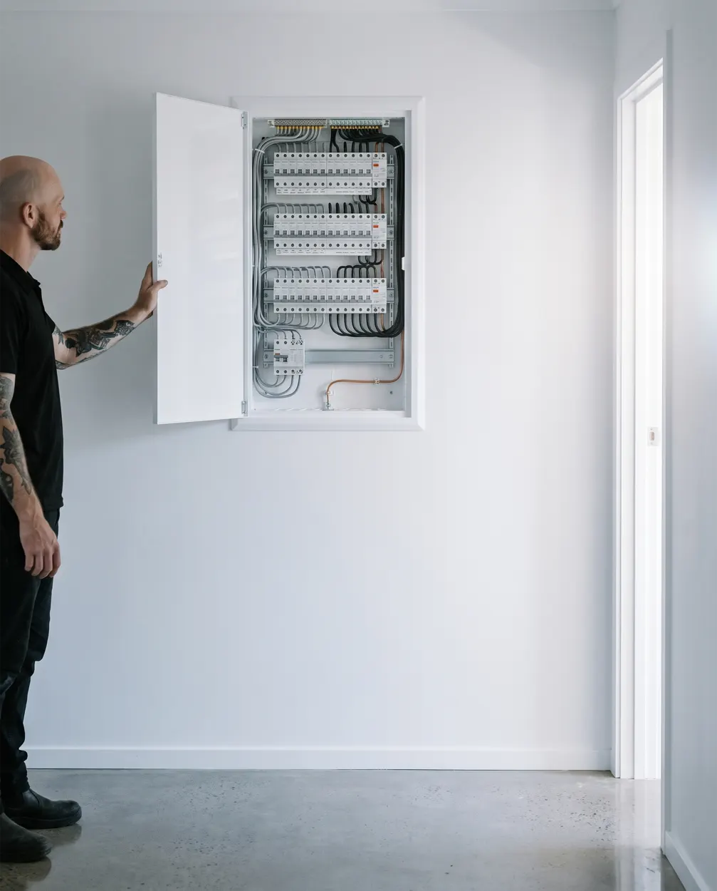 A newly installed switchboard with circuits labelled and cabling dressed